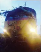  ??  ?? Damage: Sleeper train near Cupar