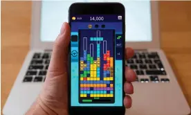  ?? Photograph: FocusTechn­ology/Alamy ?? ‘Suddenly everyone had powerful games machines in their pocket’ … Tetris on an iPhone.