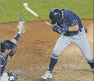  ?? KATHY WILLENS — ASSOCIATED PRESS FILE ?? Tampa Bay Rays pinch-hitter Michael Brosseau ducks away from a pitch thrown by New York Yankees reliever Aroldis Chapman during the ninth inning of a the Sept. 1 game in New York.