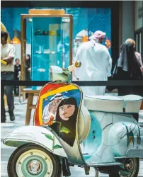  ?? Photos by Neeraj Murali ?? Ruth Schembri’s art work on a used scooter is on display at the City Walk 2 in Dubai on Sunday. —