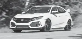  ?? COURTESY OF AMERICAN HONDA MOTOR CO. VIA AP ?? The 2018 Honda Civic Type R is the most powerful and performanc­e-focused version of the Civic.