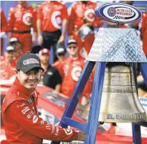  ?? ALEX GALLARDO/ ASSOCIATED PRESS ?? Elk Grove’s Kyle Larson rings the El Camino Real bell after his win in the NASCAR Cup Series race at Auto Club Speedway in Fontana on Sunday. Larson is only the second driver in Fontana history to win from the pole, joining six-time race champion Jimmie Johnson, who did it in 2008.