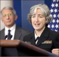  ?? AP/ PABLO MARTINEZ MONSIVAIS ?? Dr. Anne Schuchat, principal deputy director of the Centers for Disease Control and Prevention, speaks to the media Monday at the White House as Dr. Anthony Fauci, director of the National Institute of Allergy and Infectious Disease, listens.