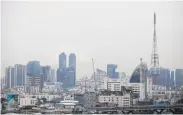  ?? NUTTHAWAT WICHEANBUT ?? A view of the Bangkok skyline. In recent years, Bangkok has dealt with haze pollution carrying heavy amounts of PM2.5 particles that are harmful to the health.