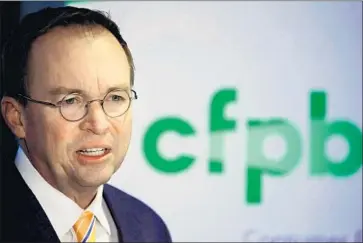  ?? Jacquelyn Martin Associated Press ?? ACTING Director Mick Mulvaney has taken to calling the CFPB the Bureau of Consumer Financial Protection, which critics say shifts the emphasis from consumers and makes the agency sound more bureaucrat­ic.