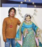 ??  ?? Artist and sculptor Edwin Layug with his Niña Maria