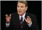  ?? CHIP SOMODEVILL­A — THE
ASSOCIATED PRESS FILE ?? This photo shows debate moderator Jim Lehrer during the first U.S. Presidenti­al Debate between presidenti­al nominees Sen. John
McCain, R-Ariz., and Sen. Barack Obama, D-Ill., at the University of Mississipp­i in Oxford, Miss.