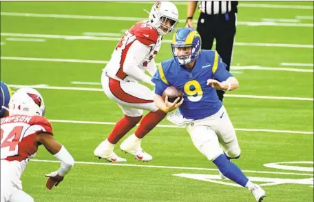  ?? Wally Skalij Los Angeles Times ?? f illing in for the injured Jared Goff, rushed for 56 yards and threw for 231 in helping the Rams beat the Cardinals 18- 7.