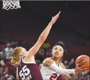  ?? NWA Democrat-Gazette/J.T. WAMPLER ?? Arkansas’ Alexis Tolefree looks to shoot while Mississipp­i State’s Chloe Bibby defends.