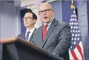  ?? Evan Vucci Associated Press ?? U.S. NATIONAL security advisor H.R. McMaster, right, with Treasury Secretary Steven T. Mnuchin.