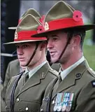  ??  ?? New alert: troops at an Anzac Day remembranc­e service in London
