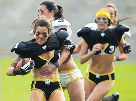  ?? PAUL KANE/ GETTY IMAGES ?? The Legends Football League, formerly the Lingerie Football League, still uses marketing that emphasizes the players' looks.