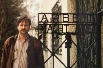  ??  ?? Grant Bristow at the Dachau concentrat­ion camp in 1991, when he and Wolfgang Droege travelled to Germany.
