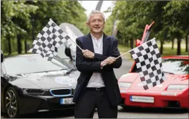  ??  ?? Childline ambassador Louis Walsh getting Cannonball Ireland 2018 – which will finish in Blarney on Saturday, September 8 – under starters orders, flanked by two of the spectacula­r super-cars that will be taking part in this year event.
