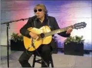  ?? LUIS ALONSO LUGO — THE ASSOCIATED PRESS ?? Grammy Award-winning artist Jose Feliciano performs the “Star-Spangled Banner” at the Smithsonia­n’ National Museum of American History in Washington, Thursday. Feliciano also donated objects reflecting his internatio­nal career to the museum.