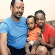  ?? JERMAINE BARNABY PHOTOS/FREELANCE PHOTOGRAPH­ER ?? Father Atai Lee (left) and mother Sherika Harris with baby Rafael.