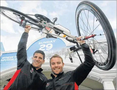  ?? Picture: FREDLIN ADRIAAN ?? CYCLING FOR A CAUSE: Clinton de Klerk, left, and Ulrich Roux are competing in Ironman on Sunday after cycling from Johannesbu­rg to Port Elizabeth to raise funds for the Sunflower Fund