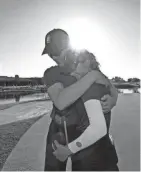  ?? JOE CAMPOREALE/USA TODAY SPORTS ?? Stanford University golfer Rachel Heck celebrates with her father Robert Heck after being crowned individual medalist during the NCAA Women’s Golf Championsh­ip at Grayhawk Golf Club in 2021.