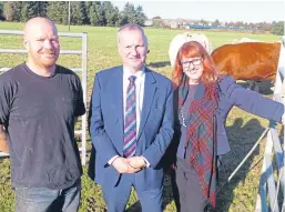  ??  ?? Farmer Alastair Wardlaw with MPs Pete Wishart and Deirdre Brock.