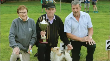  ??  ?? Organiser Florrie Dixon, Matty Duffy with his dog Kate, champion small dog of show, and judge Barty Kennedy.