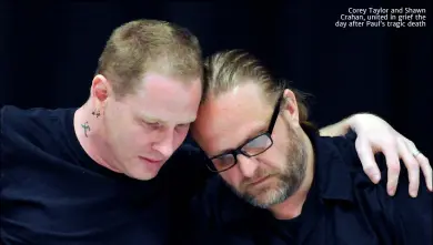  ??  ?? Corey Taylor and Shawn Crahan, united in grief the day after Paul’s tragic death