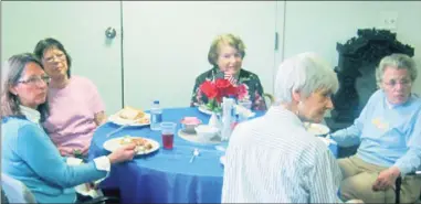  ?? Hearst Connecticu­t Media file photo ?? The Kent Senior Center will hold its first program Friday since the COVID-19 pandemic hit. In May 2013, Kent seniors and other residents witness the signing of an agreement to have local preparator­y high schools help fund the town’s cost of a state police officer.