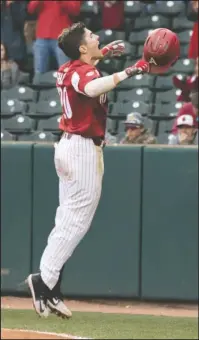  ?? Special to The Sentinel-Record/Crant Osborne ?? HOG WILD: Senior infielder Carson Shaddy, of Fayettevil­le, celebrates a three-run home run in the bottom of the first inning of Arkansas’ 16-9 victory over No. 4 Kentucky in the third game of the weekend series and second game of a Saturday...