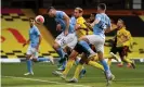  ??  ?? Aymeric Laporte heads in to bring up Manchester City’s fourth and final goal against Watford. Photograph: Andy Hooper/ NMC Pool