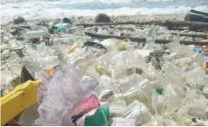  ?? — Reuters ?? Debris and plastic litter found by Tangaroa Blue, an Australian Marine debris initiative, on Christmas Island, Australia in this undated handout.