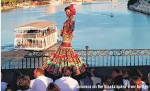  ??  ?? Flamenco on the Guadalquiv­ir river bridge