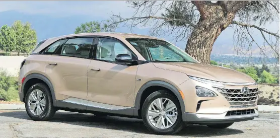  ?? GRAEME FLETCHER/DRIVING ?? The 2019 Hyundai Nexo can easily handle both a fast-moving highway or an urban environmen­t — and all while leaving zero local emissions.