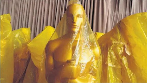  ?? CHRISTOPHE­R POLK ?? Under wraps – pundits are trying to predict who will get their hands on prestigiou­s Oscars this year