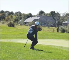  ?? RICK PECK/SPECIAL TO MCDONALD COUNTY PRESS ?? Lily Allman uses a little body English to try to get her chip shot to fall in at the Missouri Class 2 Girls Golf Championsh­ips held Oct. 21-22 at Silo Ridge Golf and Country Club in Bolivar.