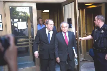  ??  ?? Harvey Weinstein (Left) departs with his lawyer Benjamin Brafman following a court appearance at Manhattan Criminal Court on July 9, 2018 in New York City. Weinstein, who was previously indicted on charges involving two women, is facing three new...