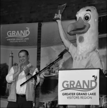  ?? Staff photo/Skyler Mitchell ?? Matt Berry, donning the Dancing Seymour the Seagull costume, accepted the Ambassador Award Thursday evening at the Greater Grand Lake Region Visitors Center annual awards reception.