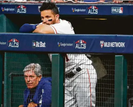  ?? Brett Coomer / Staff photograph­er ?? A dejected Jose Altuve reflects the mood in Minute Maid Park after Boston eliminated the Astros from the playoffs Thursday.