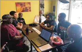  ?? JEREMY P. KELLEY / STAFF ?? City, school and community leaders discuss efforts to help more young black students succeed in life July 30 at the Third Perk Coffeehous­e & Wine Bar downtown.