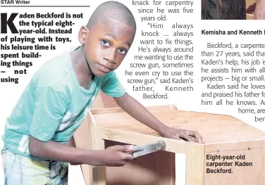  ??  ?? Kemisha and Kenneth Beckford with their gifted boy, Kaden.
Eight-year-old carpenter Kaden Beckford.