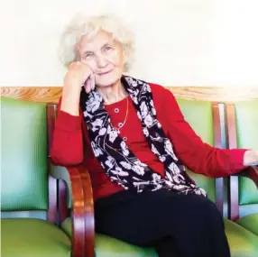  ??  ?? Elderly woman sitting in a waiting room at doctor or counselor’s office, lost in thoughts