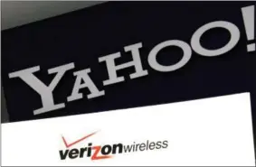  ?? FILE PHOTO ?? Yahoo and Verizon Wireless logos on a laptop, in North Andover, Mass.