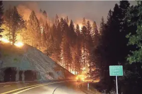  ?? TREVOR HUGHES/USA TODAY ?? The Carr Fire in Redding, Calif., has destroyed almost 900 homes. At least six people have died, including two firefighte­rs.