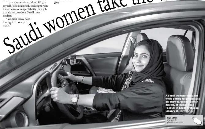  ?? Photo: VCG ?? A Saudi woman tests a car while posing for photos at a car show targeting women drivers, at Jeddah Food Festival in Saudi Arabia on January 18.