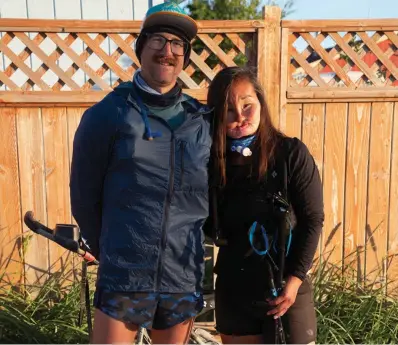  ??  ?? DONE AT LAST – Tim Lemaire, a physician at Norton Sound Health Corporatio­n, and Carol Seppilu, who also works at NSHC, walked 72 miles from Teller to Nome.