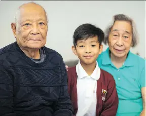  ?? FRANCIS GEORGIAN ?? R.J. Pena, 8, was honoured in October for helping great-grandmothe­r Felicisima Aquino, right, out of their burning home, while also grabbing a phone to call 911 and informing a neighbour where his great-grandfathe­r Luis Aquino was so he could be rescued.