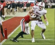  ?? CURTIS COMPTON — THE ASSOCIATED PRESS ?? UMass wide receiver Andy Isabella (Mayfield) gets past Georgia’s Eric Stokes for a 75-yard touchdown reception during the second half Nov. 17 in Athens, Ga.