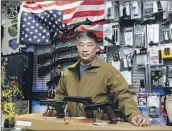  ?? Raul Roa Los Angeles Times ?? DAVID LIU says more customers at his Arcadia gun shop have been asking about concealed carry permits.