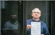  ?? SOFIA SANDURSKAY­A, MOSCOW NEWS AGENCY PHOTO VIA AP ?? Novi resident Paul Whelan, a former U.S. Marine who was arrested for alleged spying, listens to the verdict in a courtroom at the Moscow City Court in Moscow, Russia, on June 15, 2020.