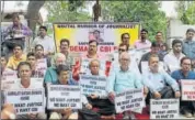  ?? PTI ?? Journalist­s stage a protest demanding a CBI probe into journalist Shantanu Bhowmik’s murder case in Agartala on Monday.