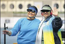  ?? GETTY IMAGES ?? Pistol shooter Anisa Sayyed (right) won Commonweal­th Games gold in 2010 and silver in 2014.