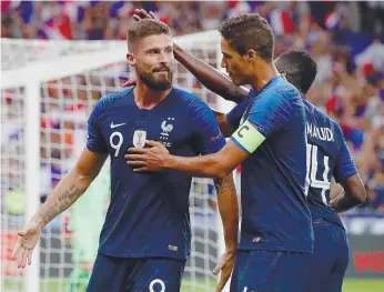  ??  ?? Giroud passou a somar 32 golos com a França, em 83 internacio­nalizações